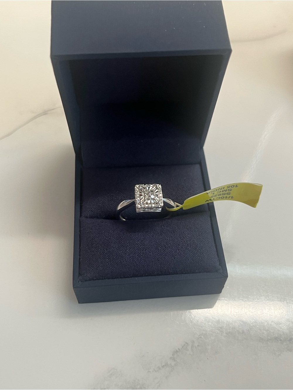 Square halo ring from Macy's. 1/10 Natural Diamonds 925 silver band. Brand New